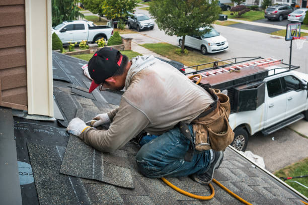 Professional Roofing technician working in Hillrose, CO